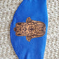 Hamsa face Cover , on Israeli blue background, metallic gold printed design, pocket filter face mask, adjustable ear straps with clips